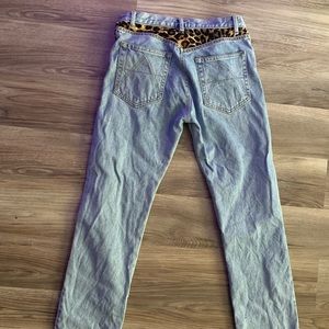 Cache vintage jeans with leopard accent and studded with amber jewels